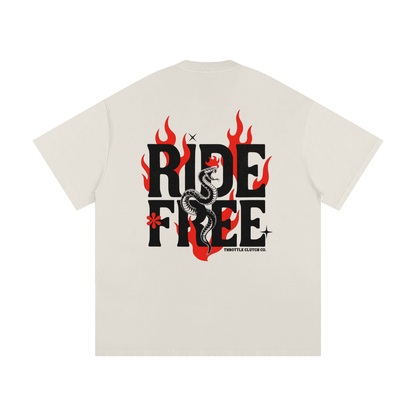 Beige t-shirt with 'Ride Free' graphic design on a white background